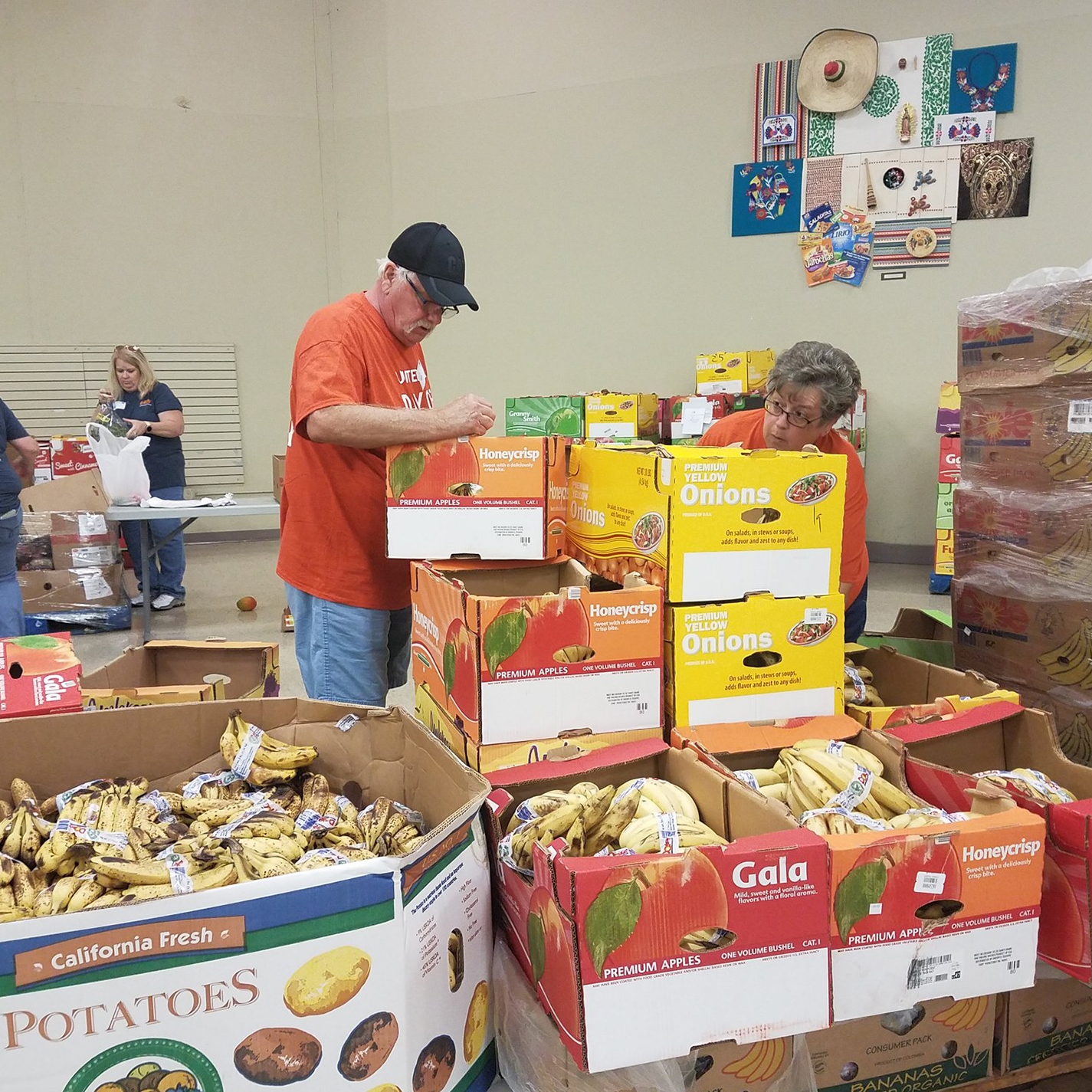LES employee at food donation
