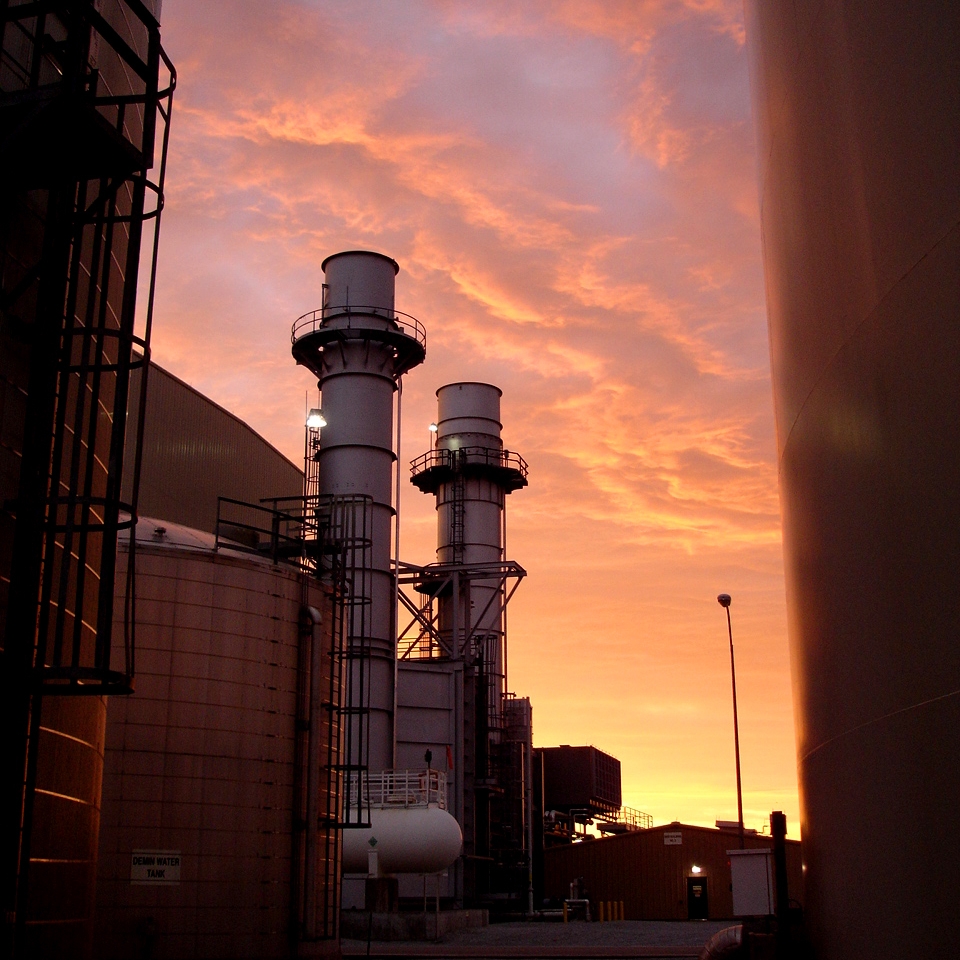 Power facility at sunset