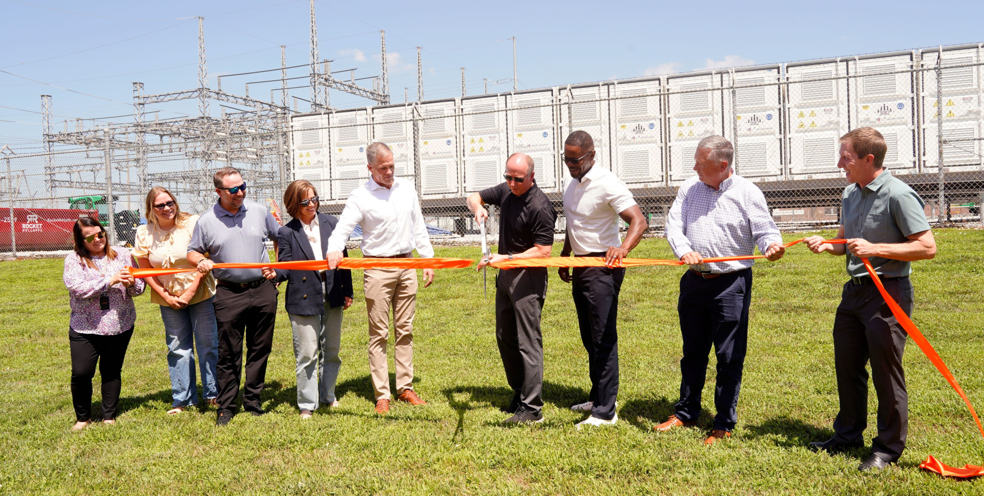 LES leaders and community stakeholders cut the ribbon to unveil the new battery storage system.
